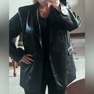 Women's Black Faux  Leather Jacket
Fits more like an XL